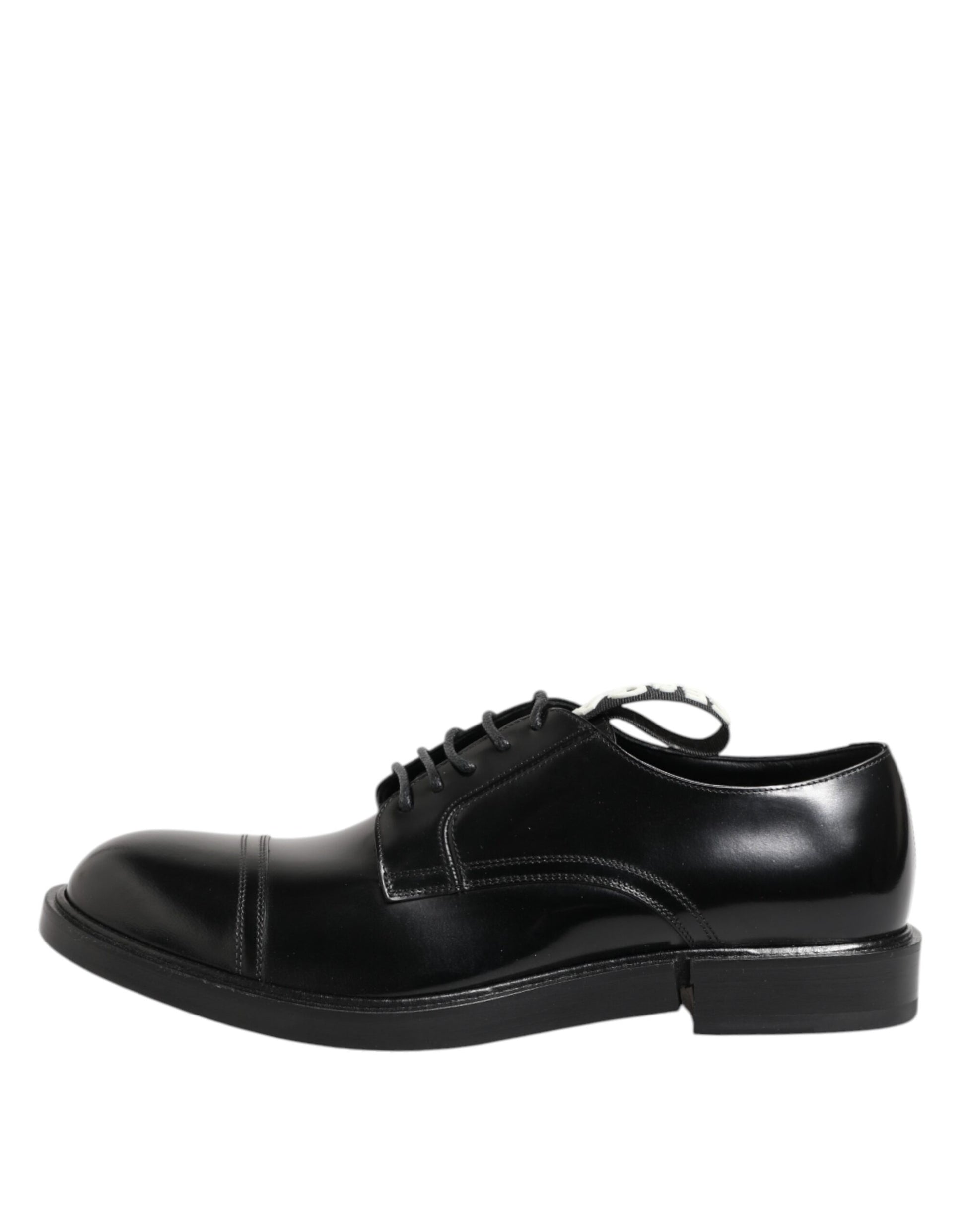 A pair of black leather dress shoes with laces, featuring a polished finish and a classic design