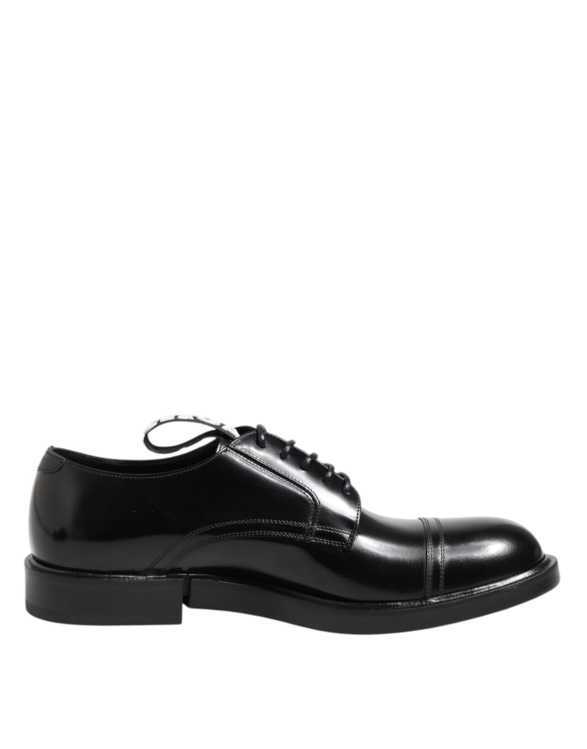 A pair of black leather dress shoes with laces, featuring a polished finish and a sturdy sole