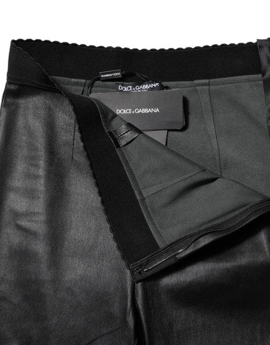 Pair of black trousers with a label on the waistband