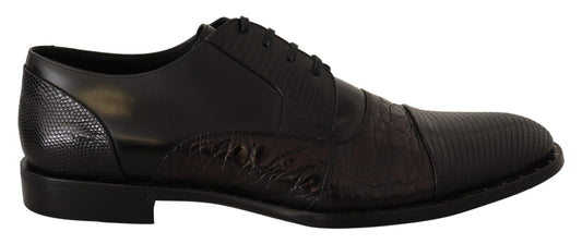 Pair of black dress shoes with a patterned design on the side