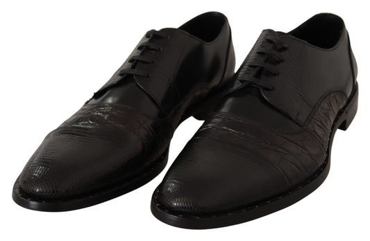 Pair of black dress shoes with laces and a patterned design on the vamp