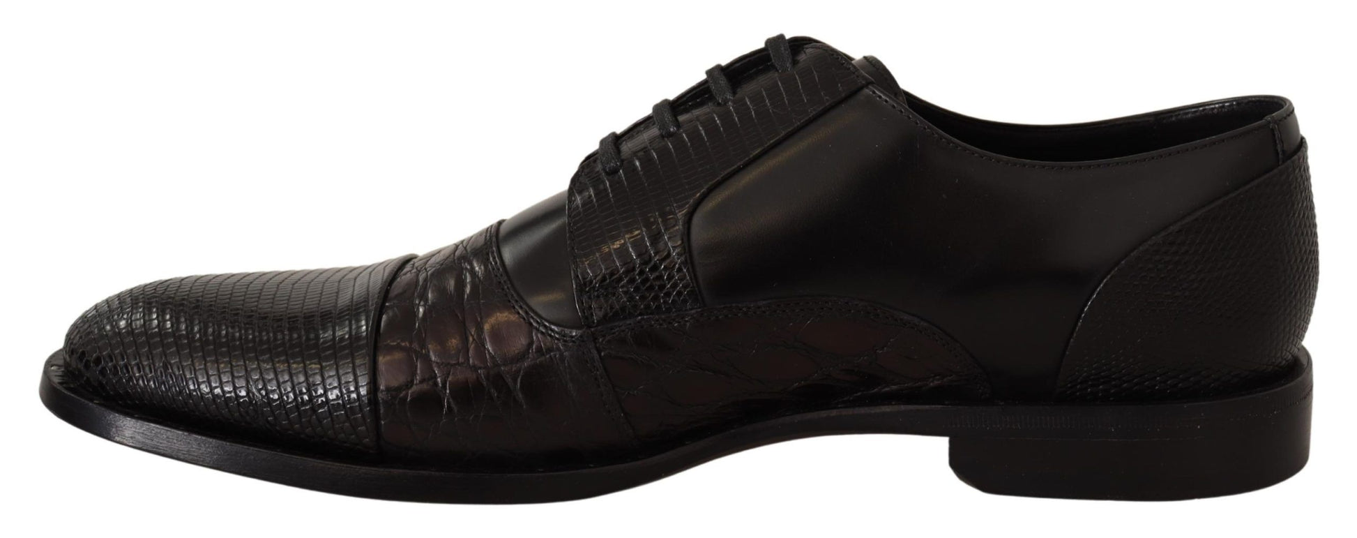 Pair of black dress shoes with laces and a patterned design on the side