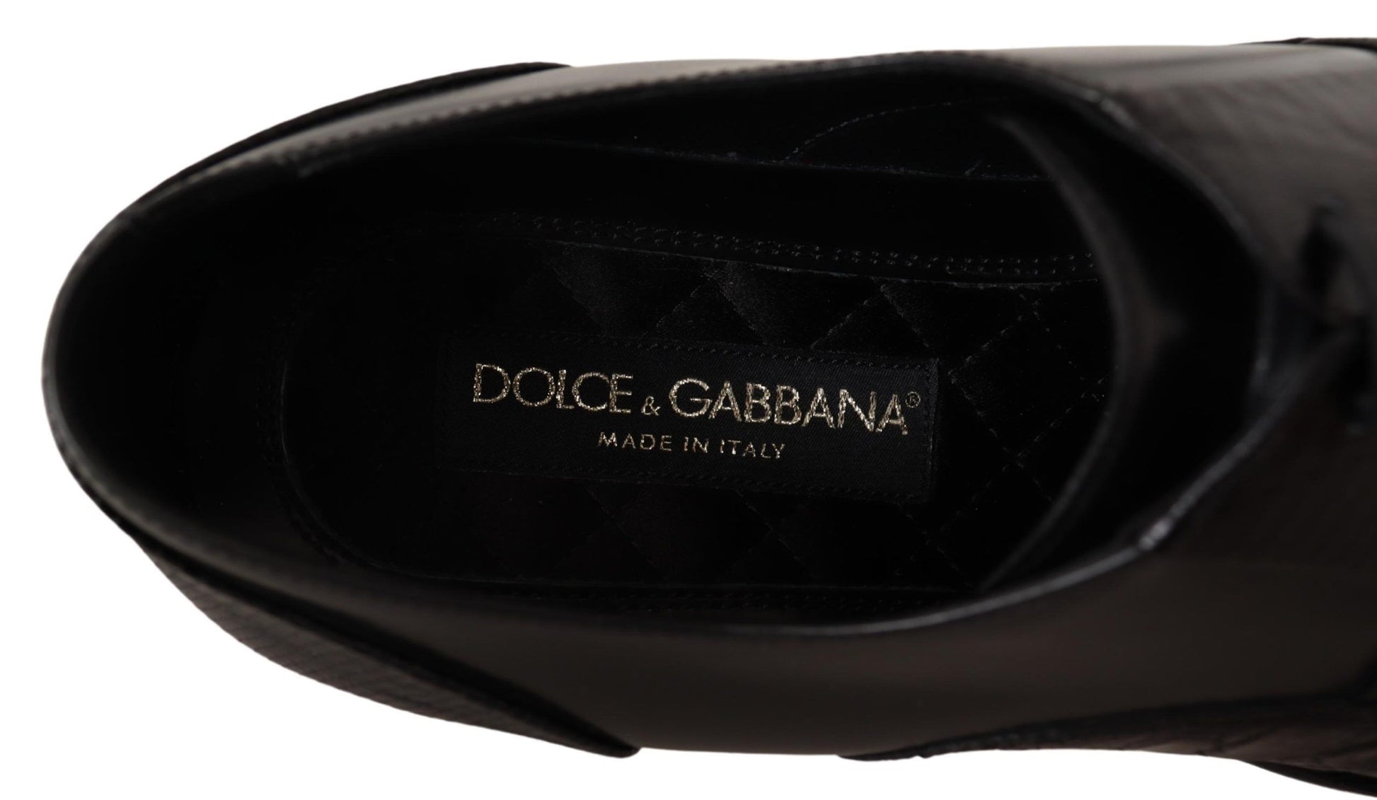 Black shoe with gold branding
