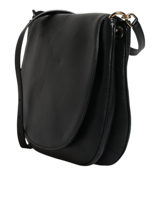 Black leather crossbody bag with gold zipper pulls