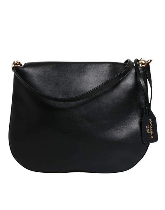 Black leather crossbody bag with gold accents