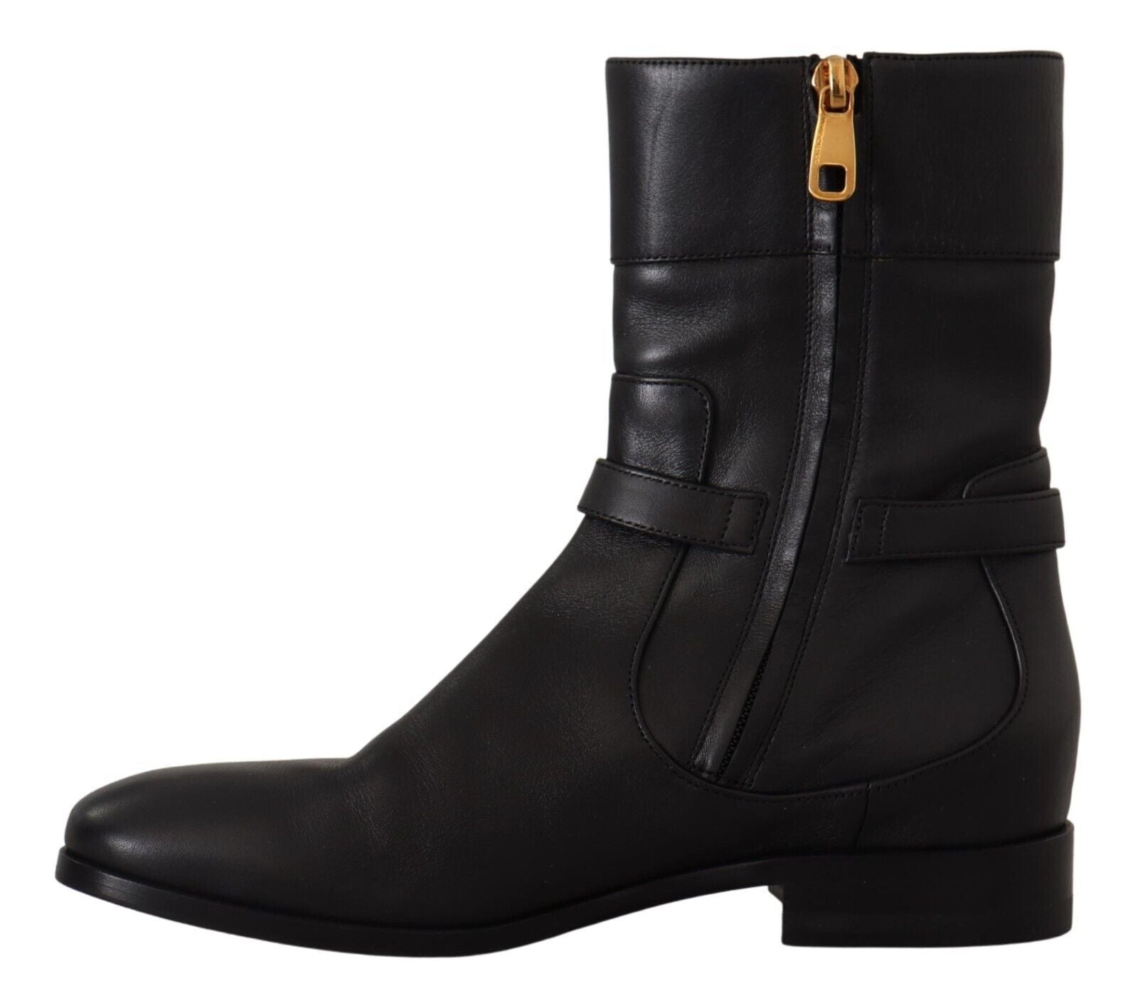 Black leather boot with gold zipper pull