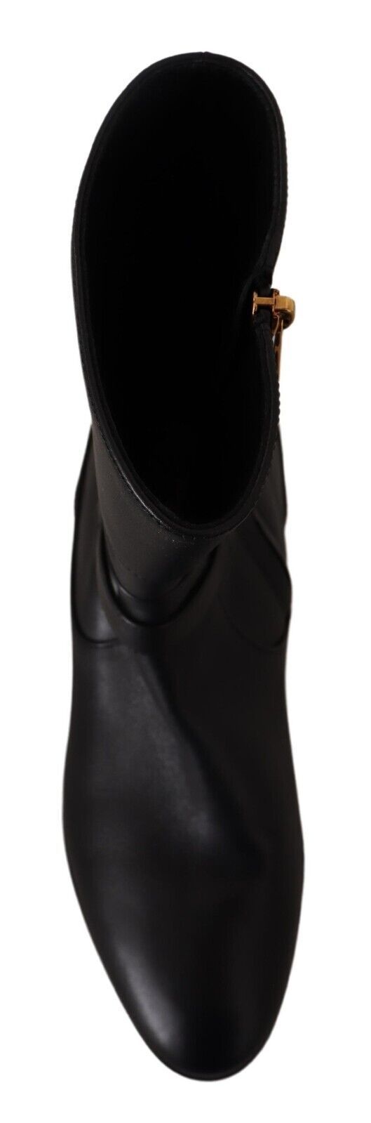 Pair of black leather boots with laces and a zipper on the side