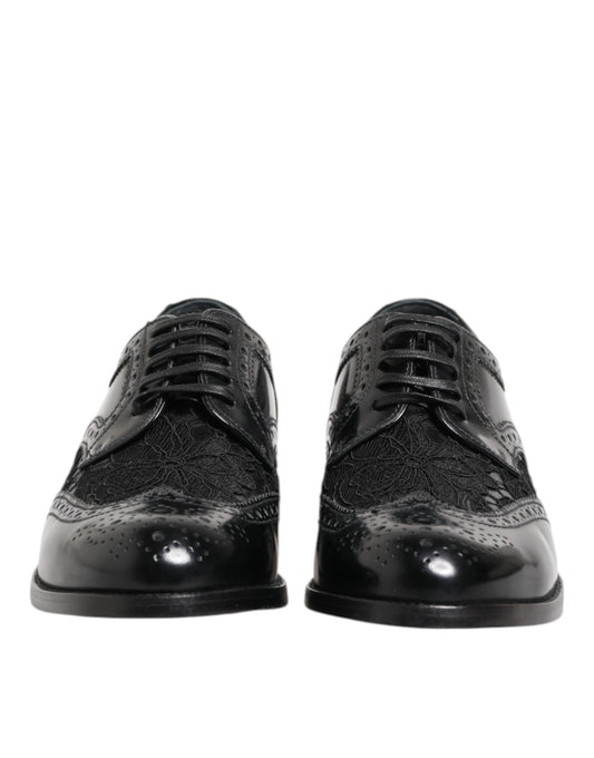 Pair of black leather dress shoes with lace and floral pattern, formal wear