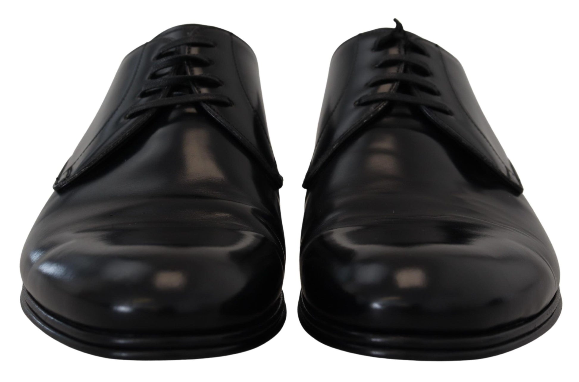 Pair of black dress shoes with laces and a shiny finish