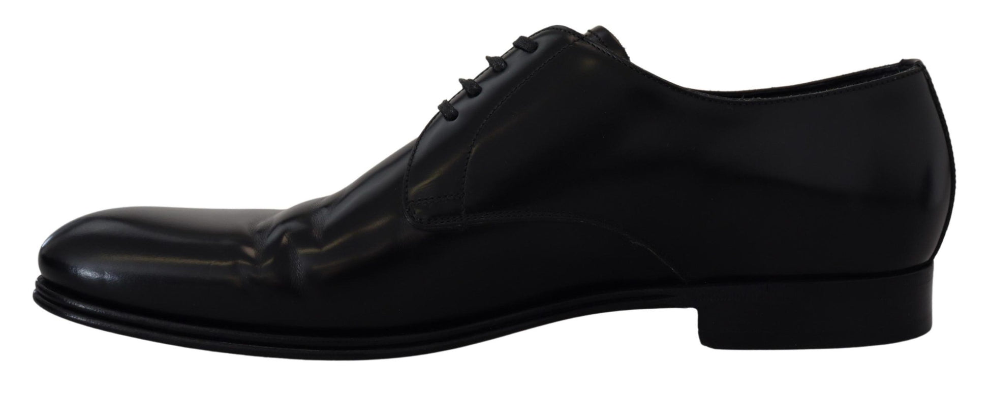 Pair of black dress shoes with laces and a small heel