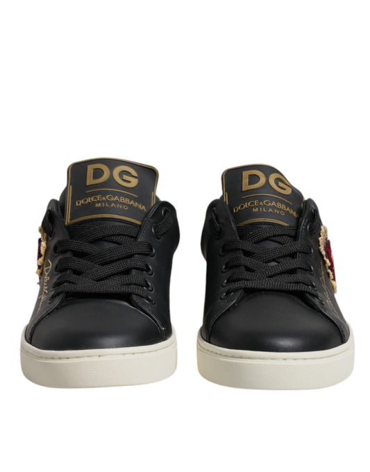 Black sneakers with gold lettering on side