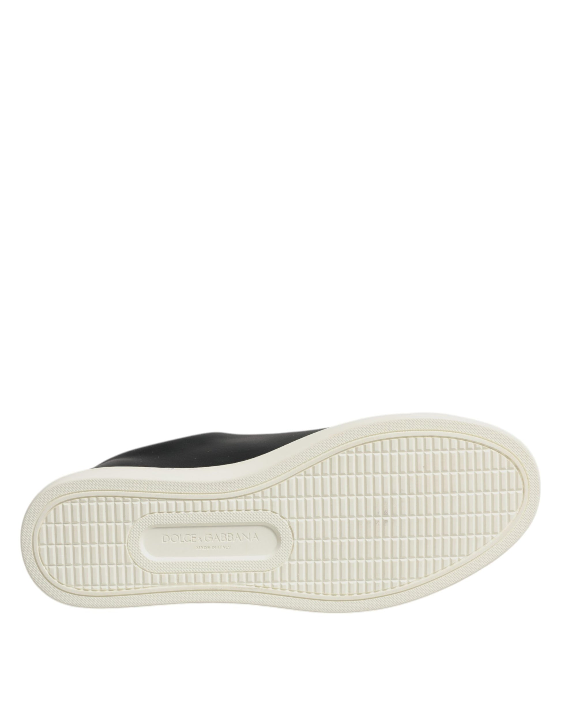 White sneaker with black sole