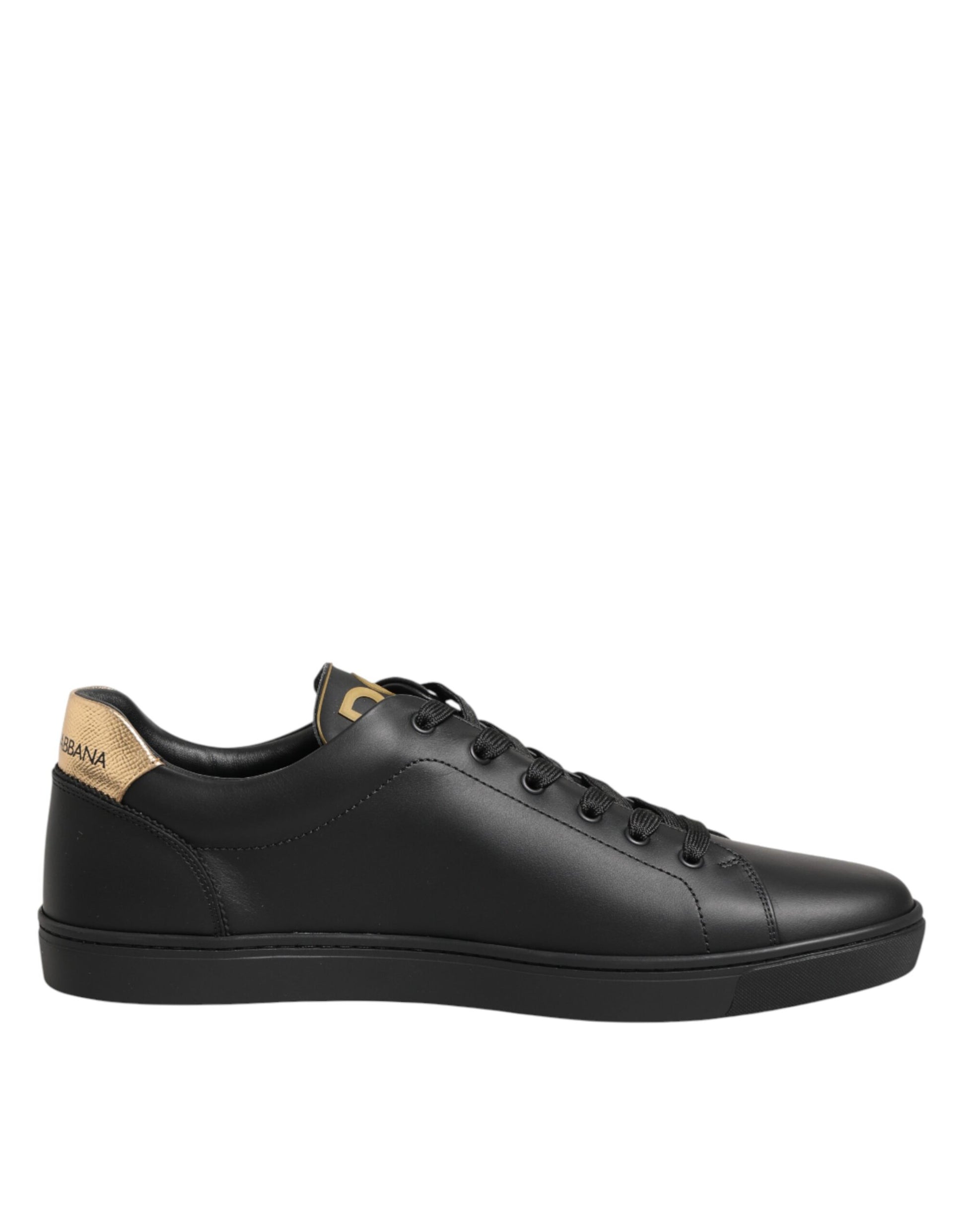 Black sneaker with gold accents