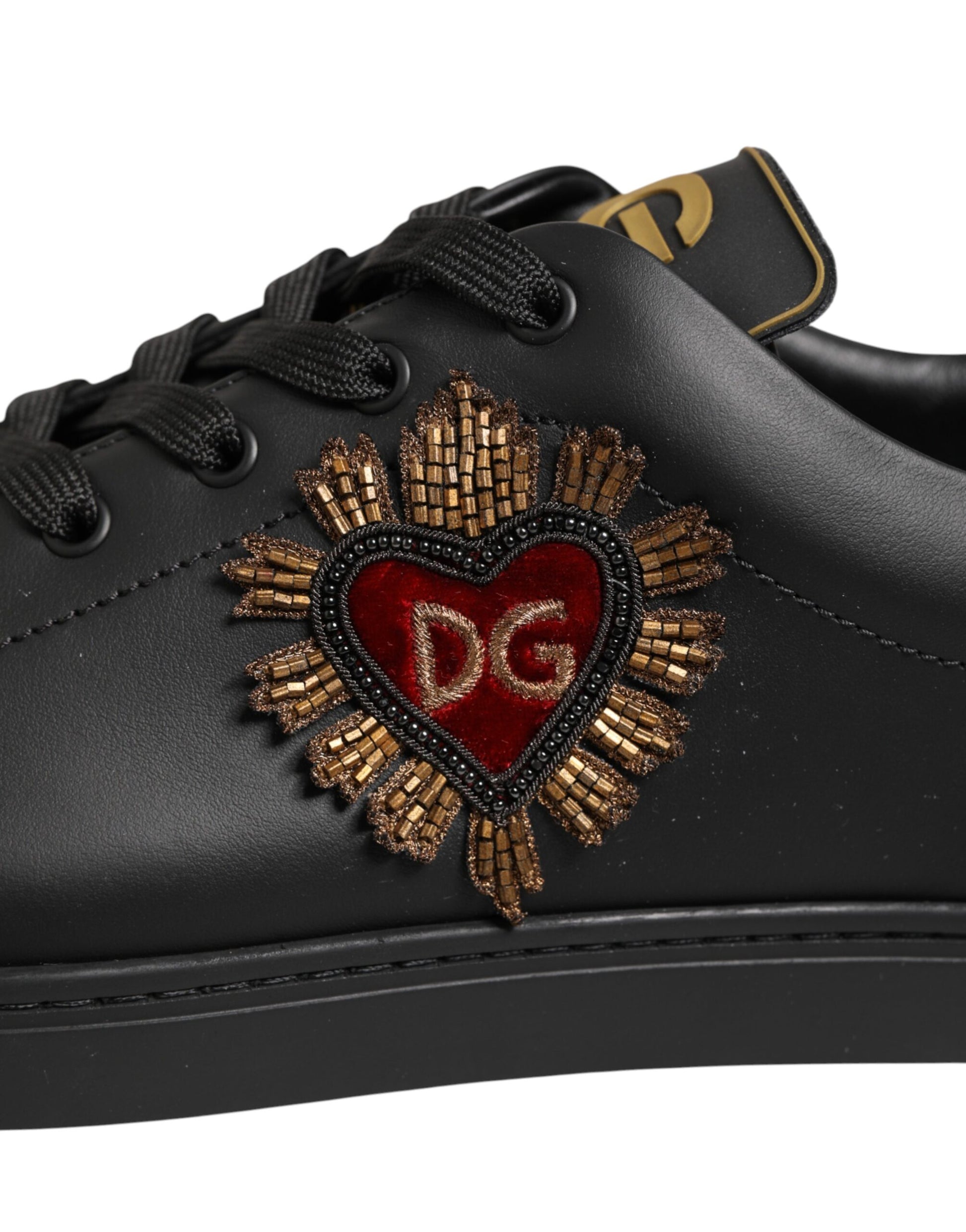 Black shoe with heart design on side
