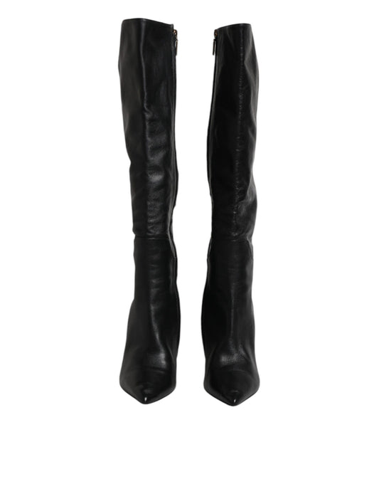Pair of black knee high boots