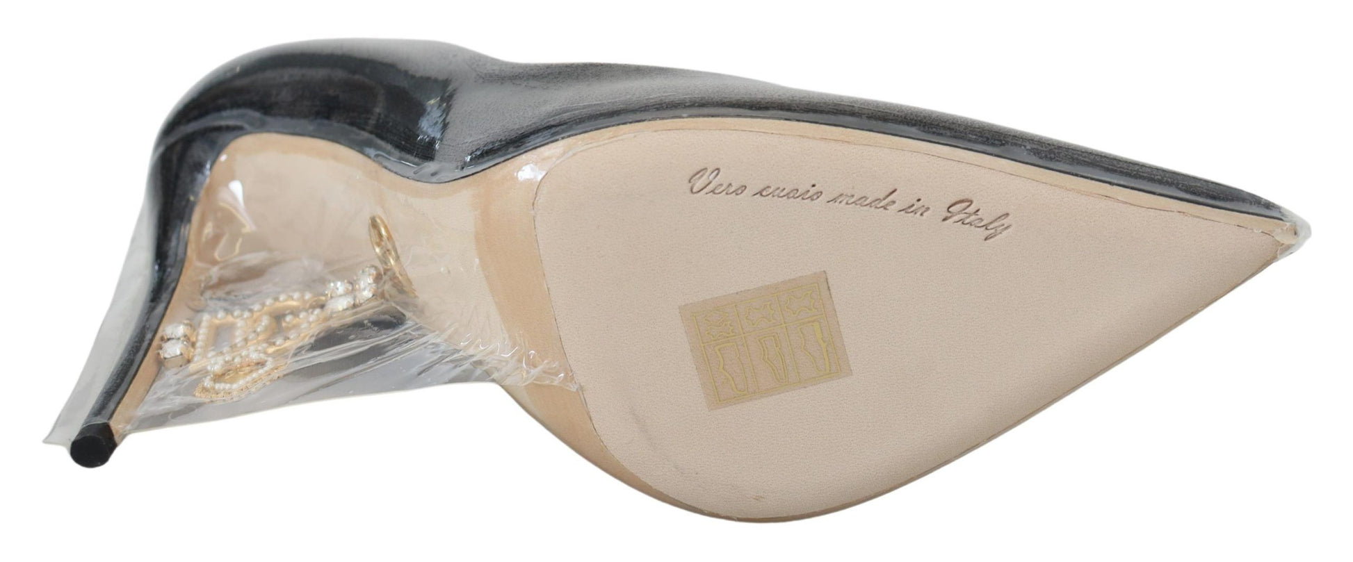 A pair of sunglasses with a unique design that resembles a bird's head. The frame is black and has a glossy finish, while