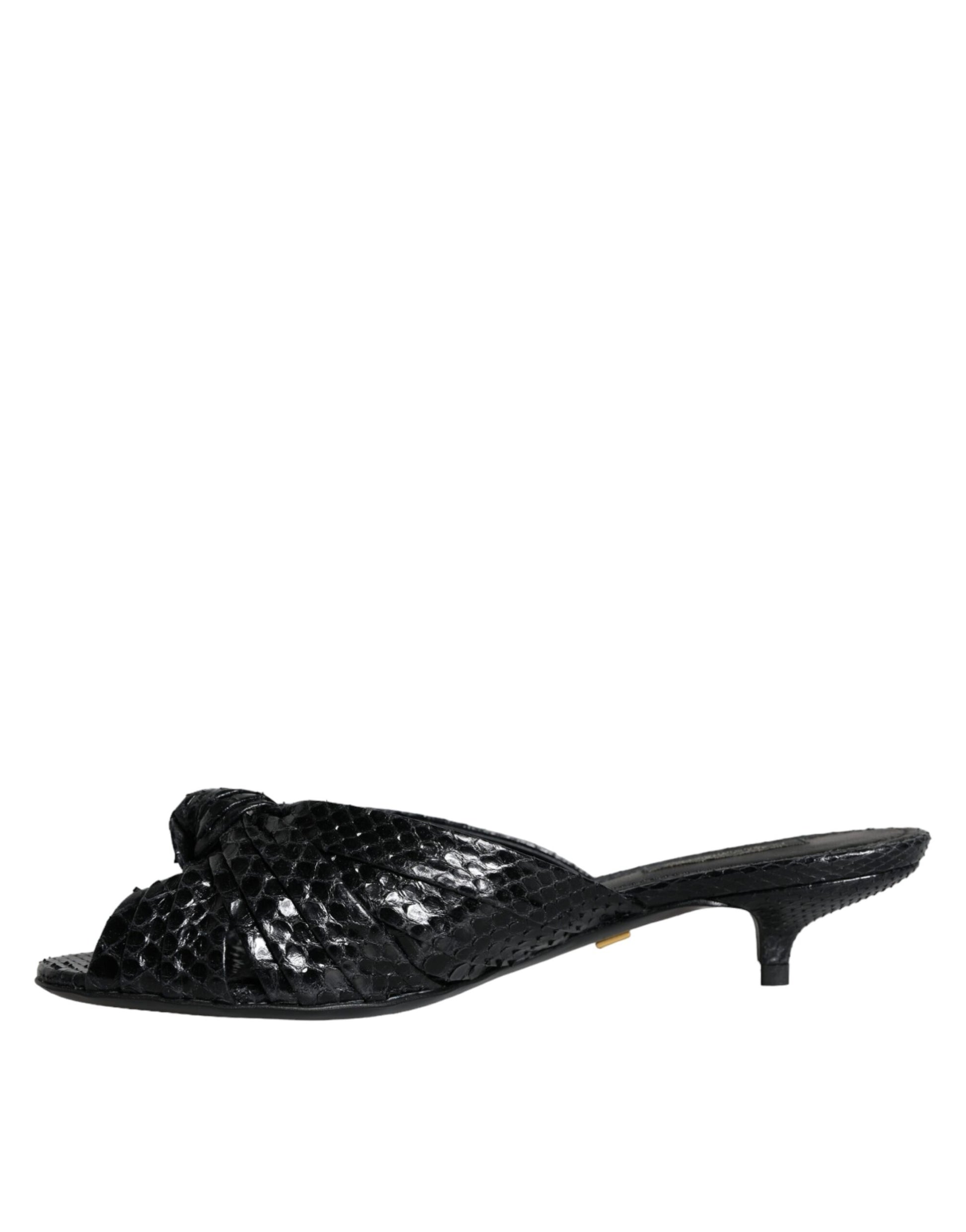 Black high heel shoe with embossed design