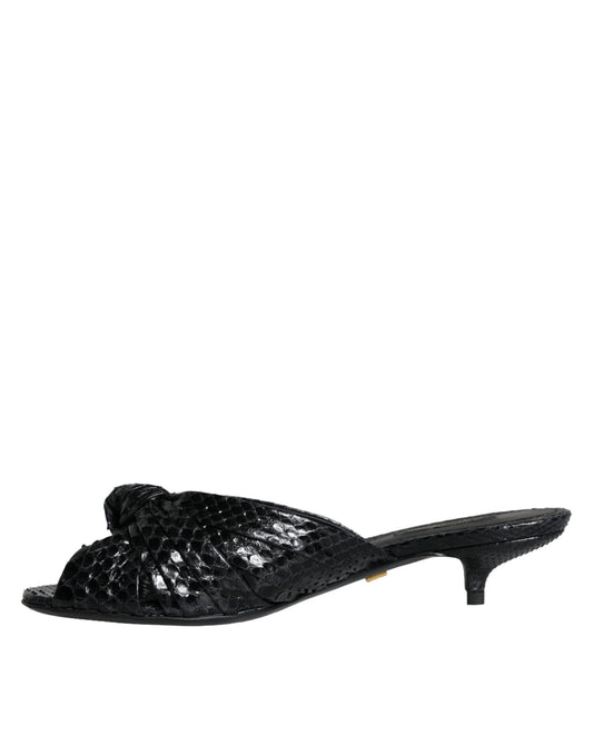Black high heel shoe with embossed design