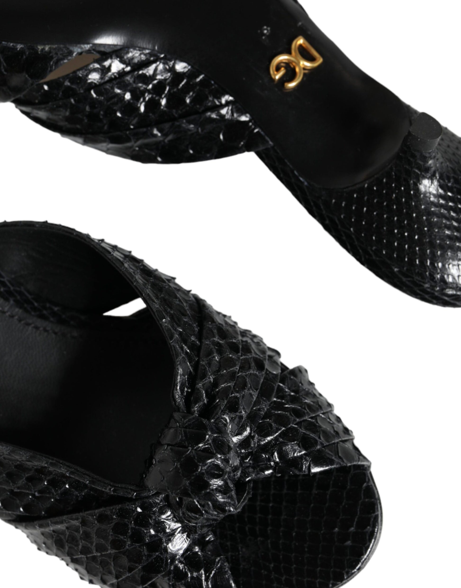 Pair of black glittery women's shoes with gold buckle