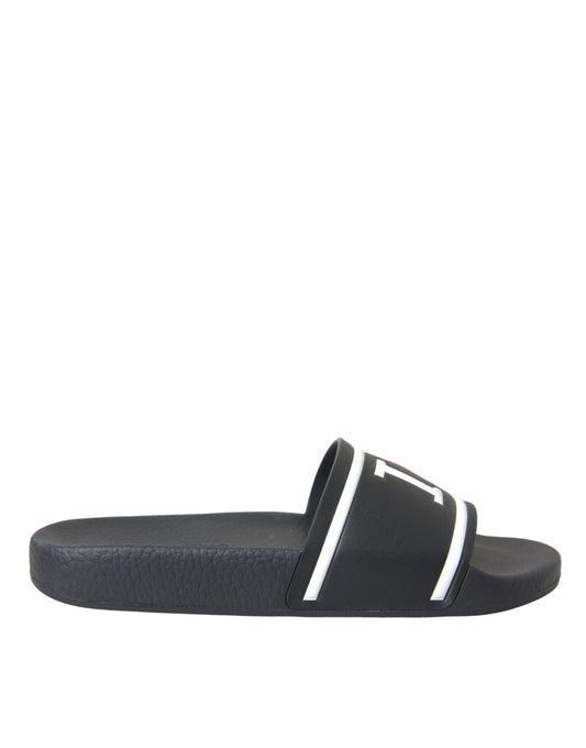 Black sandal with white stripe on footbed