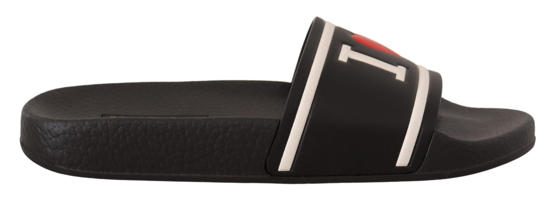Pair of black sandals with white stripes and buckles