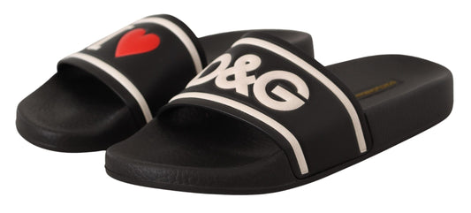 Pair of black flip flops with white and red decorations