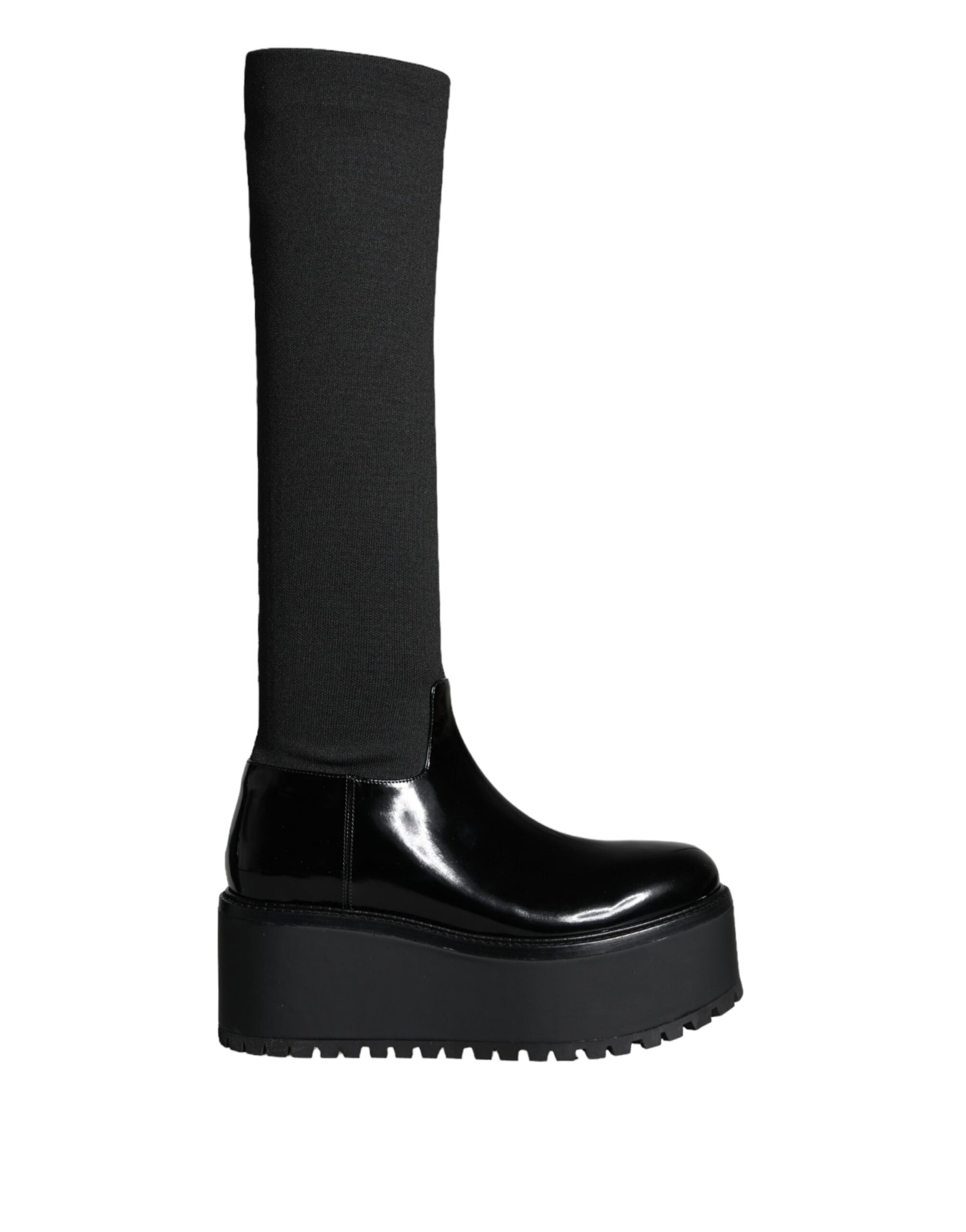 Black boot with high heel and black sock