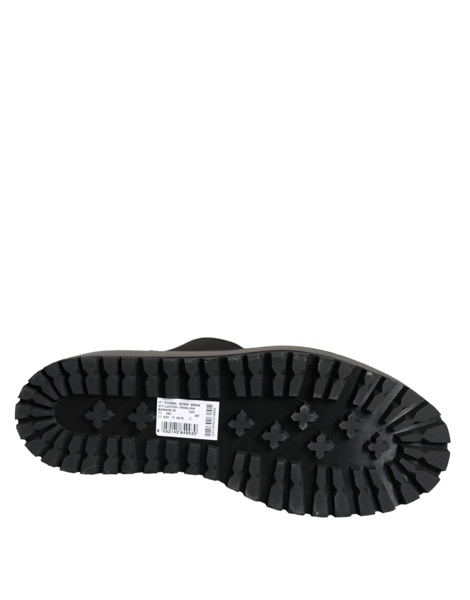 Black rubber boot with treads on sole