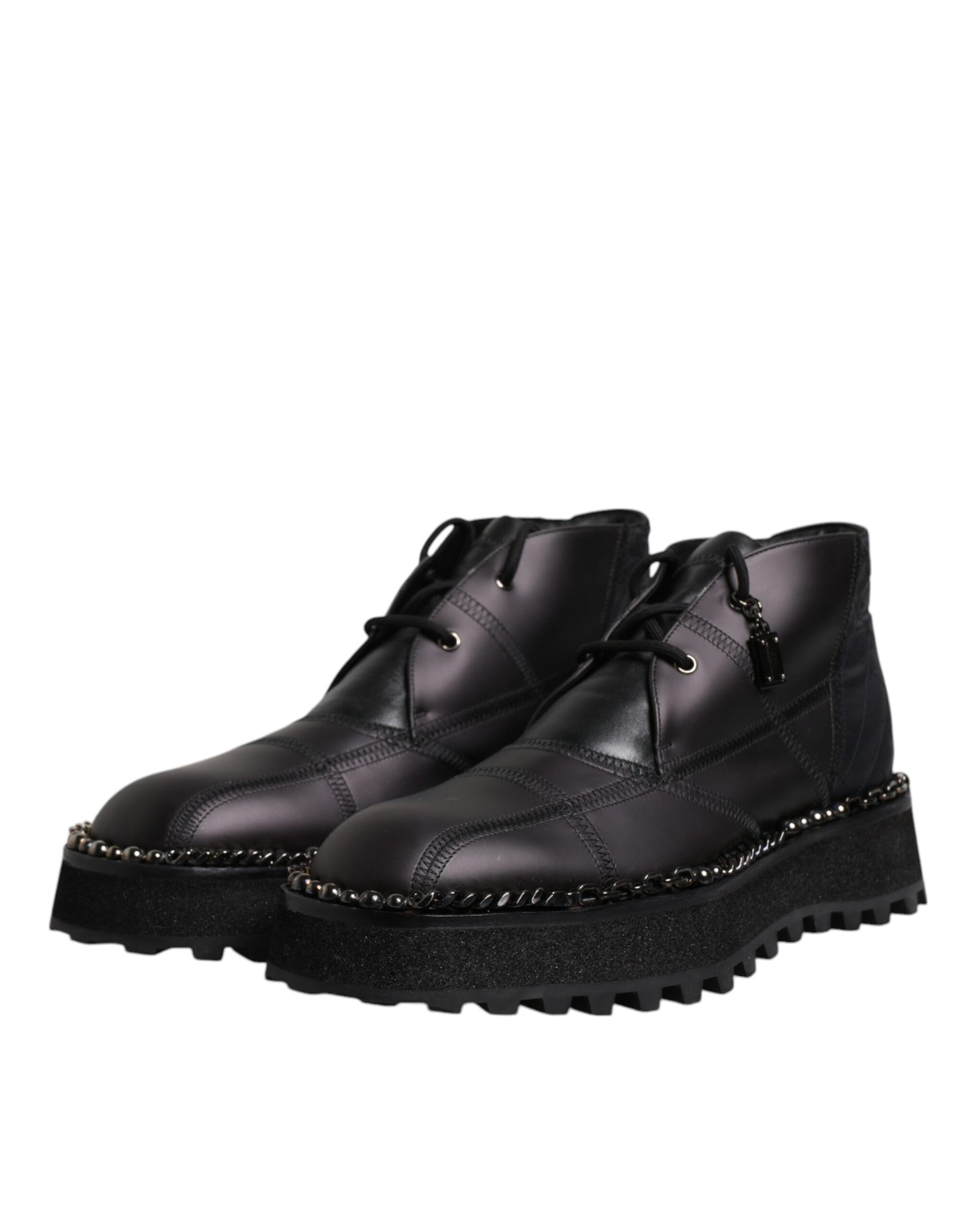 Pair of black boots with chunky heels and laces