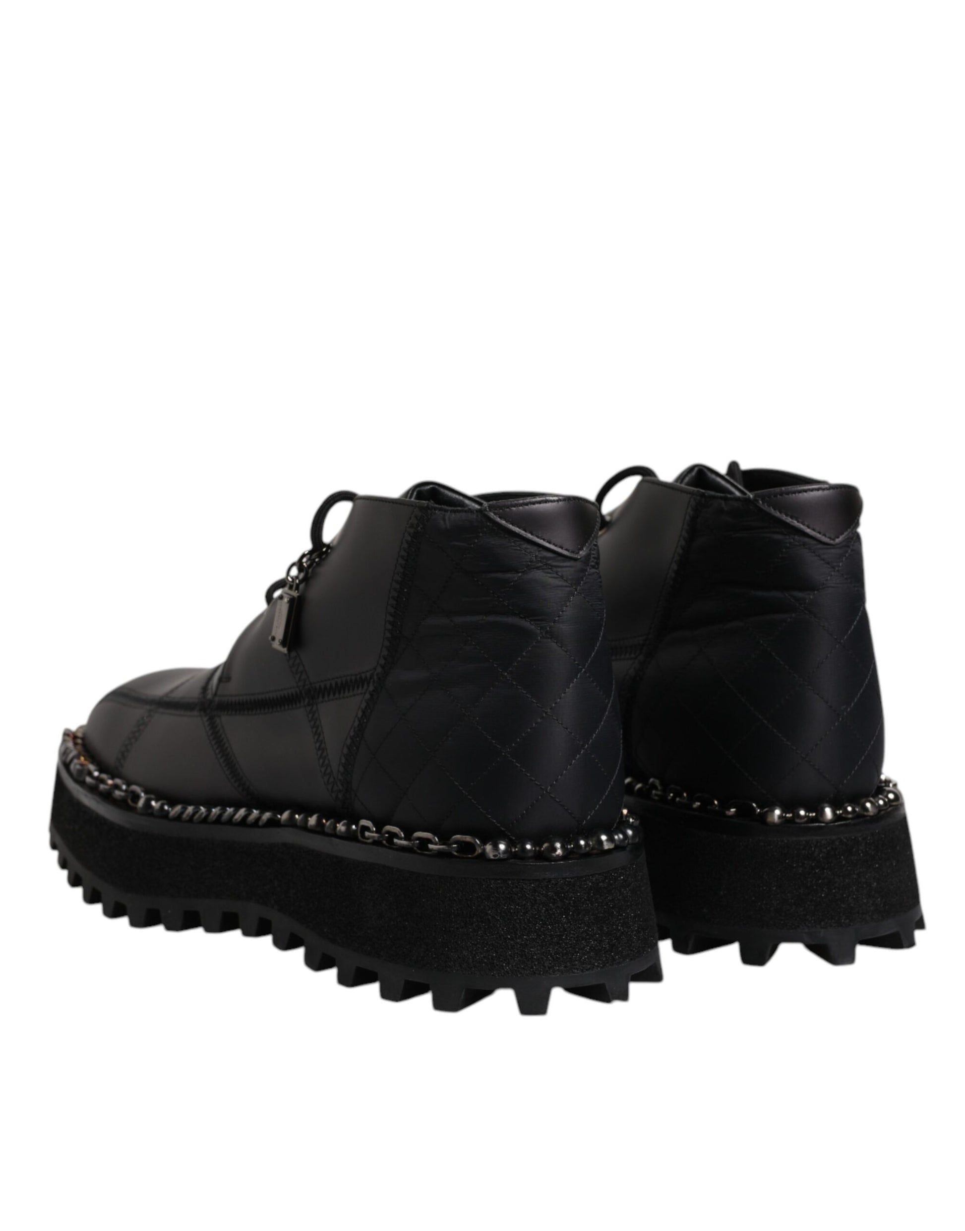 Pair of black boots with silver studs