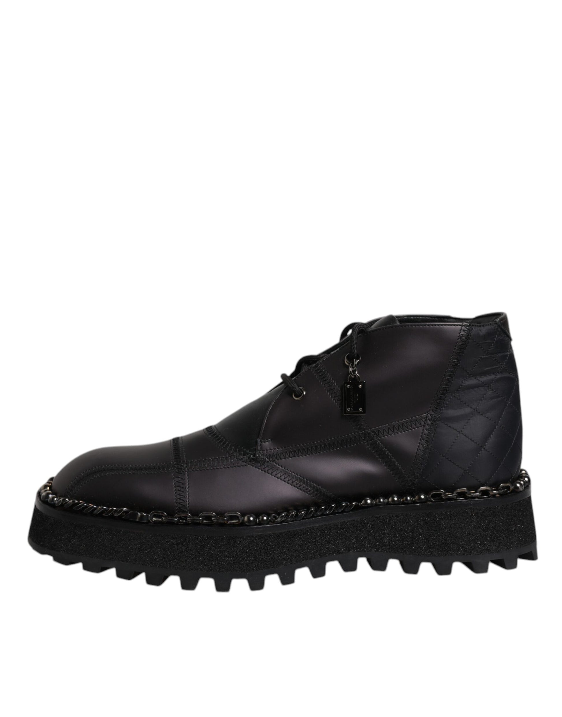 Black leather boot with studs on soles