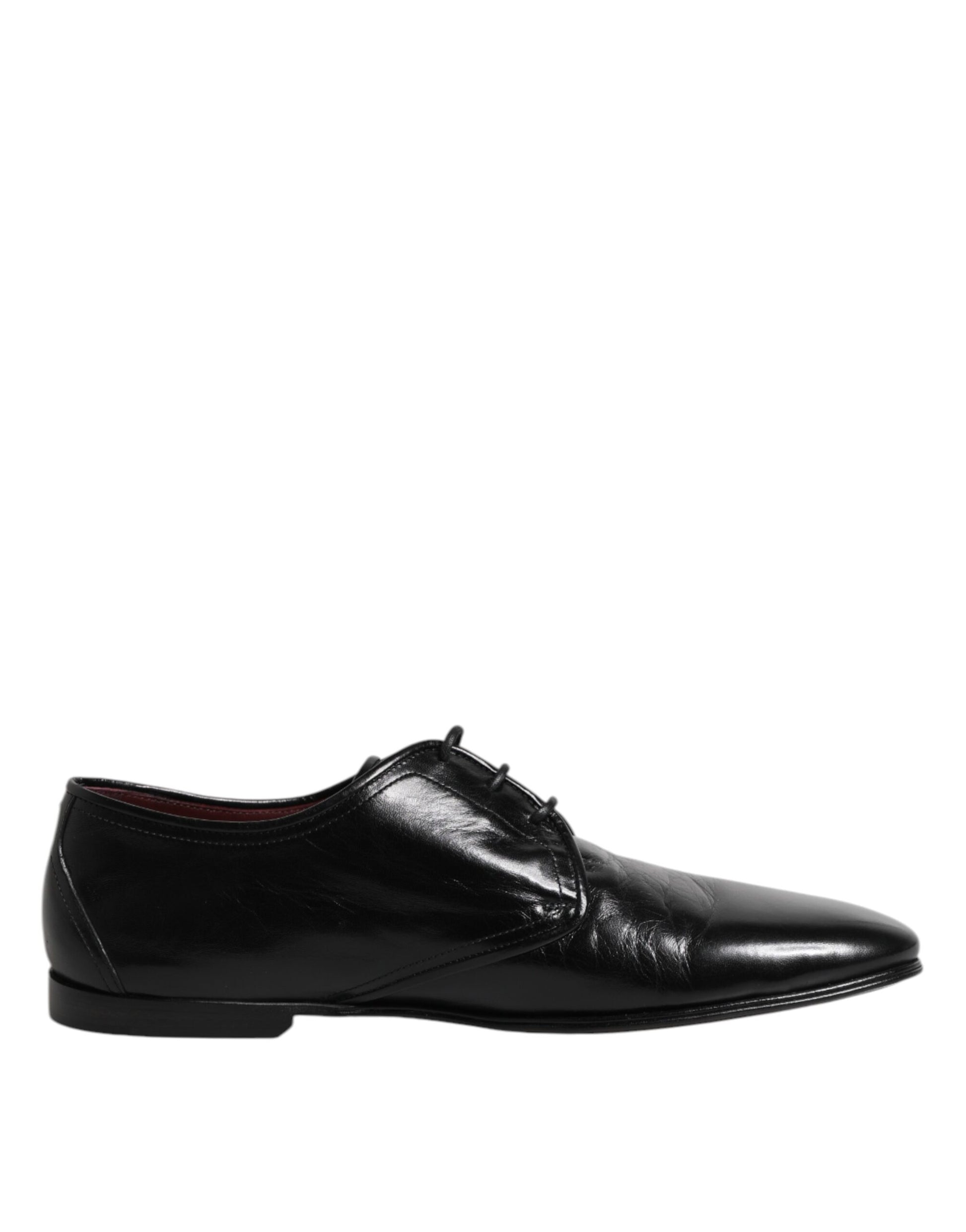 A pair of black leather lace-up dress shoes with a shiny finish
