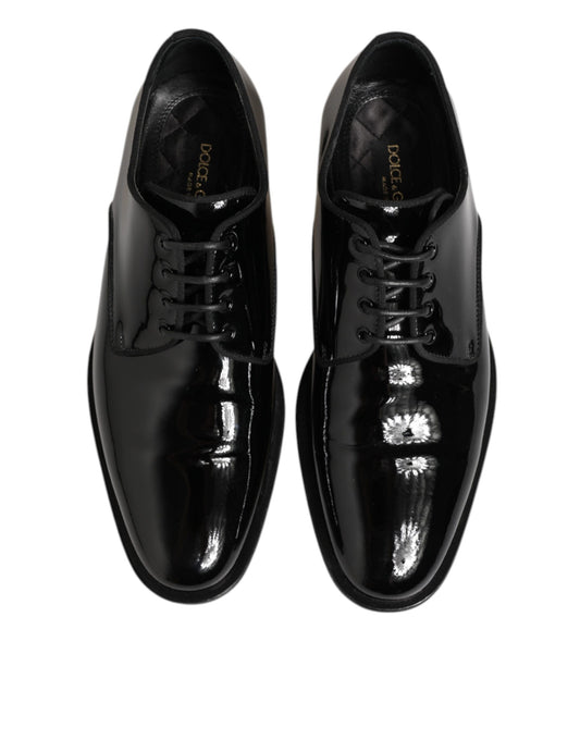 Pair of black leather lace-up dress shoes with silver accents, by Dolce & Gabbana