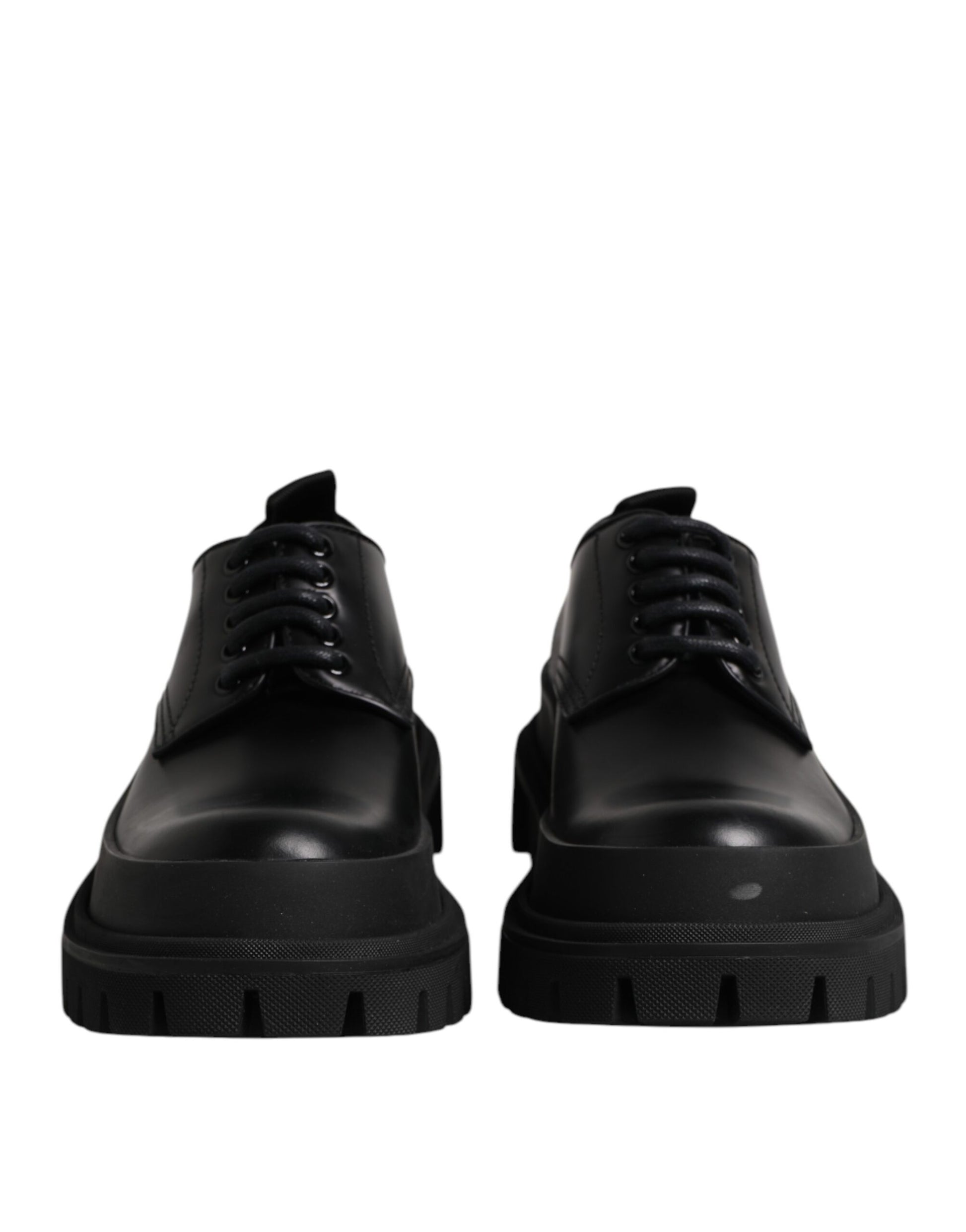 Pair of black leather lace-up dress shoes with rubber soles, designed by Dolce & Gabbana