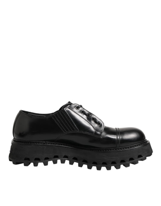 A pair of black leather lace-up dress shoes with a chunky sole, designed by Dolce & Gabbana
