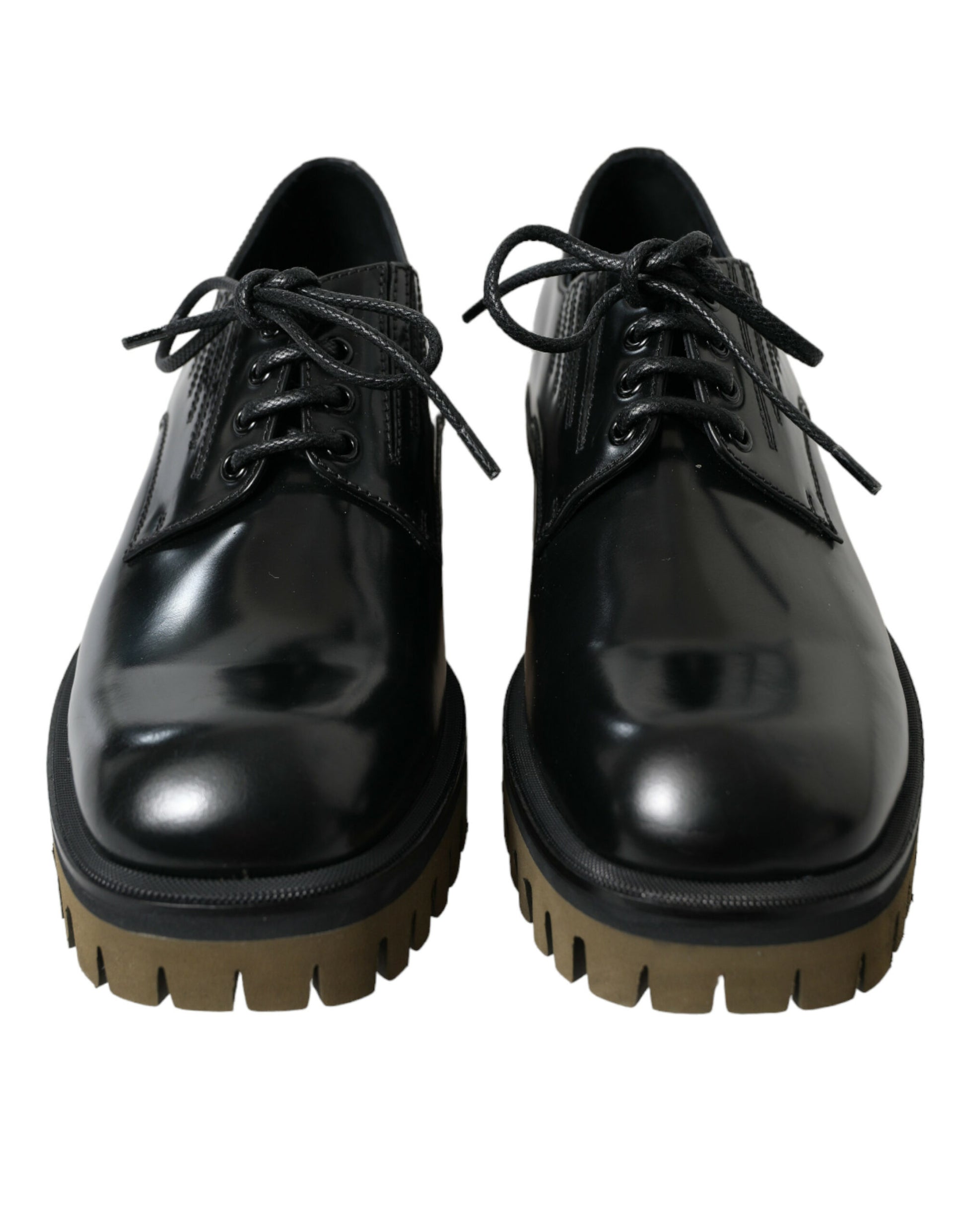 Pair of black dress shoes with laces and chunky heels