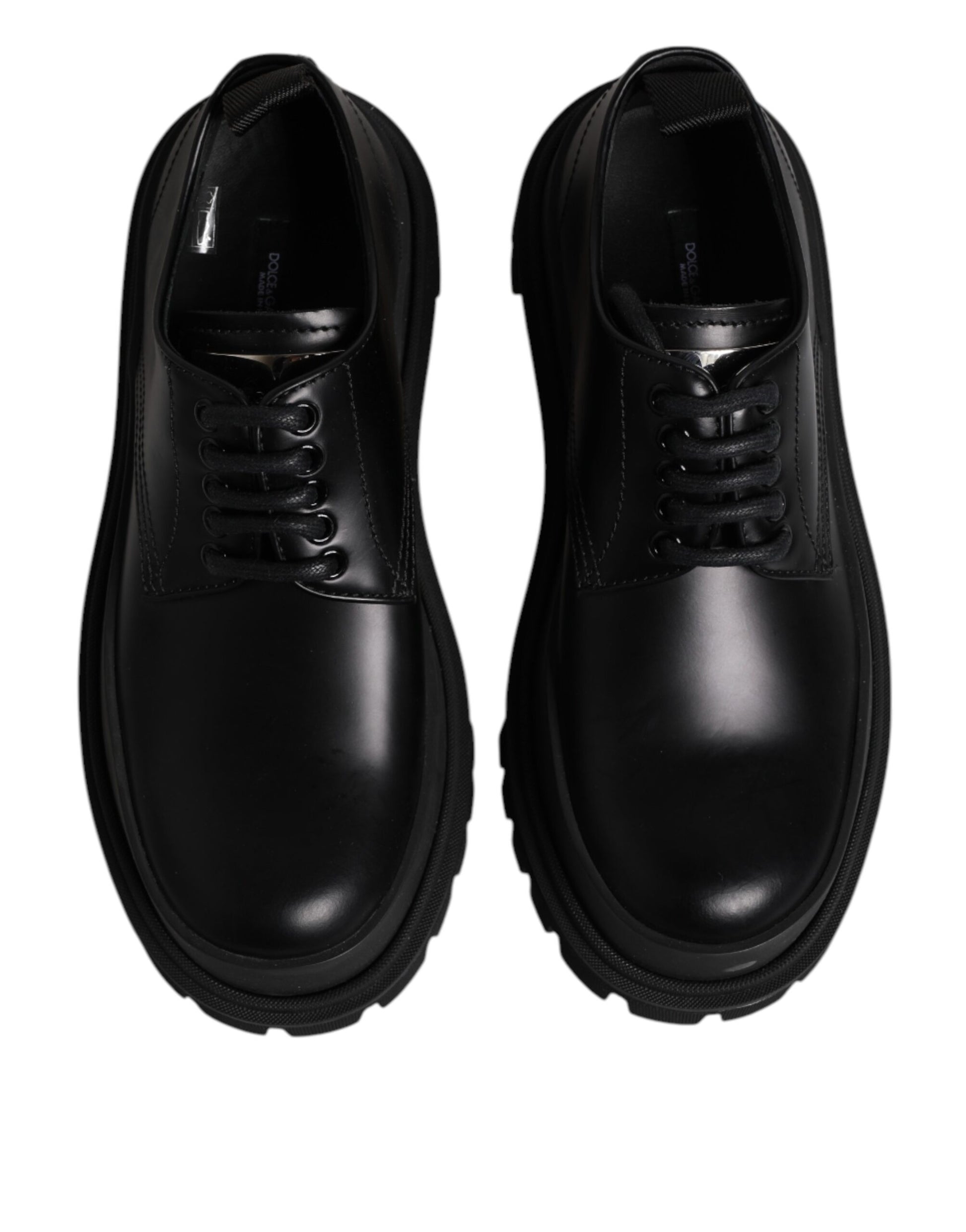 Pair of black leather lace-up dress shoes with a low heel and elastic panels