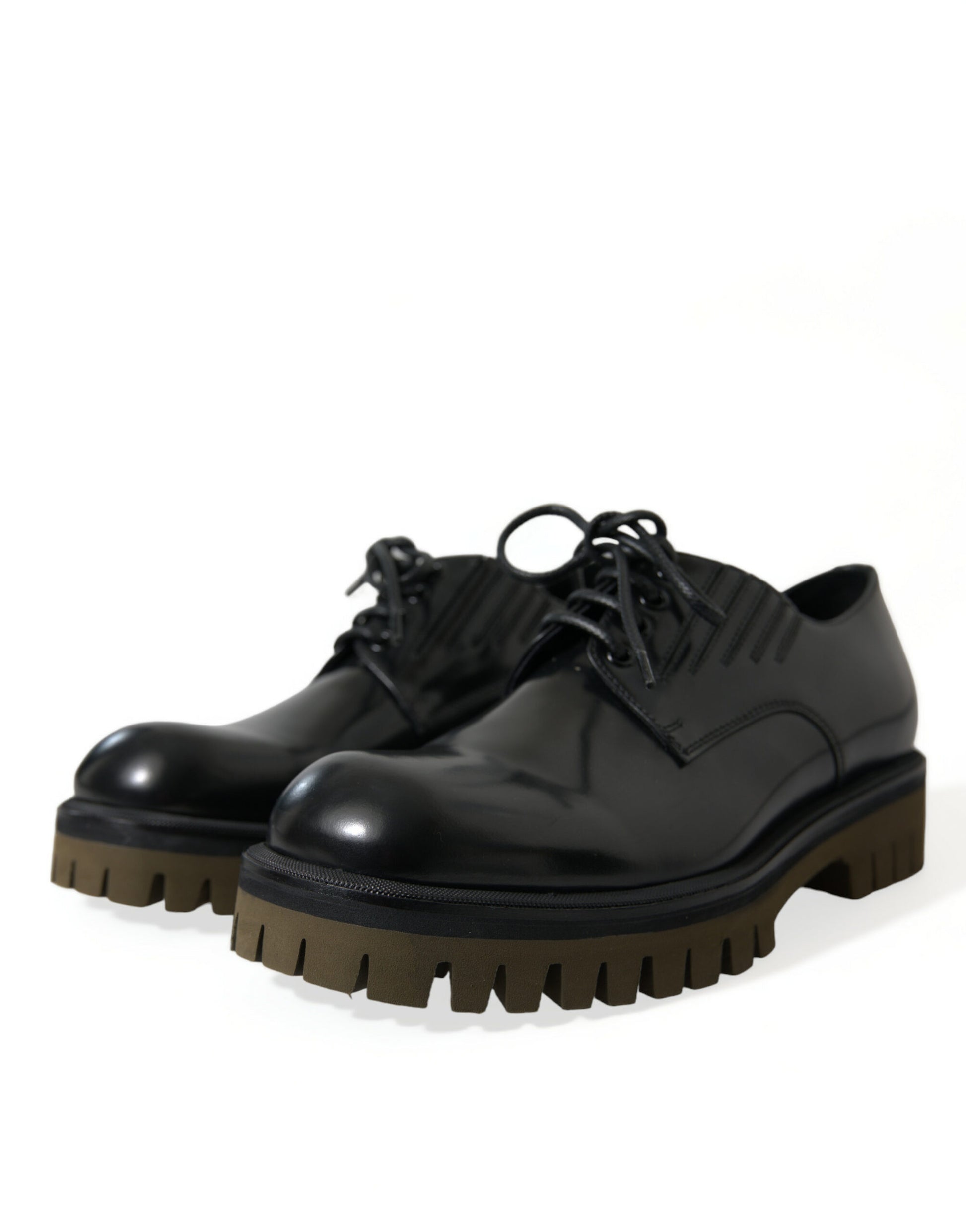 Black leather shoes with brown soles and laces