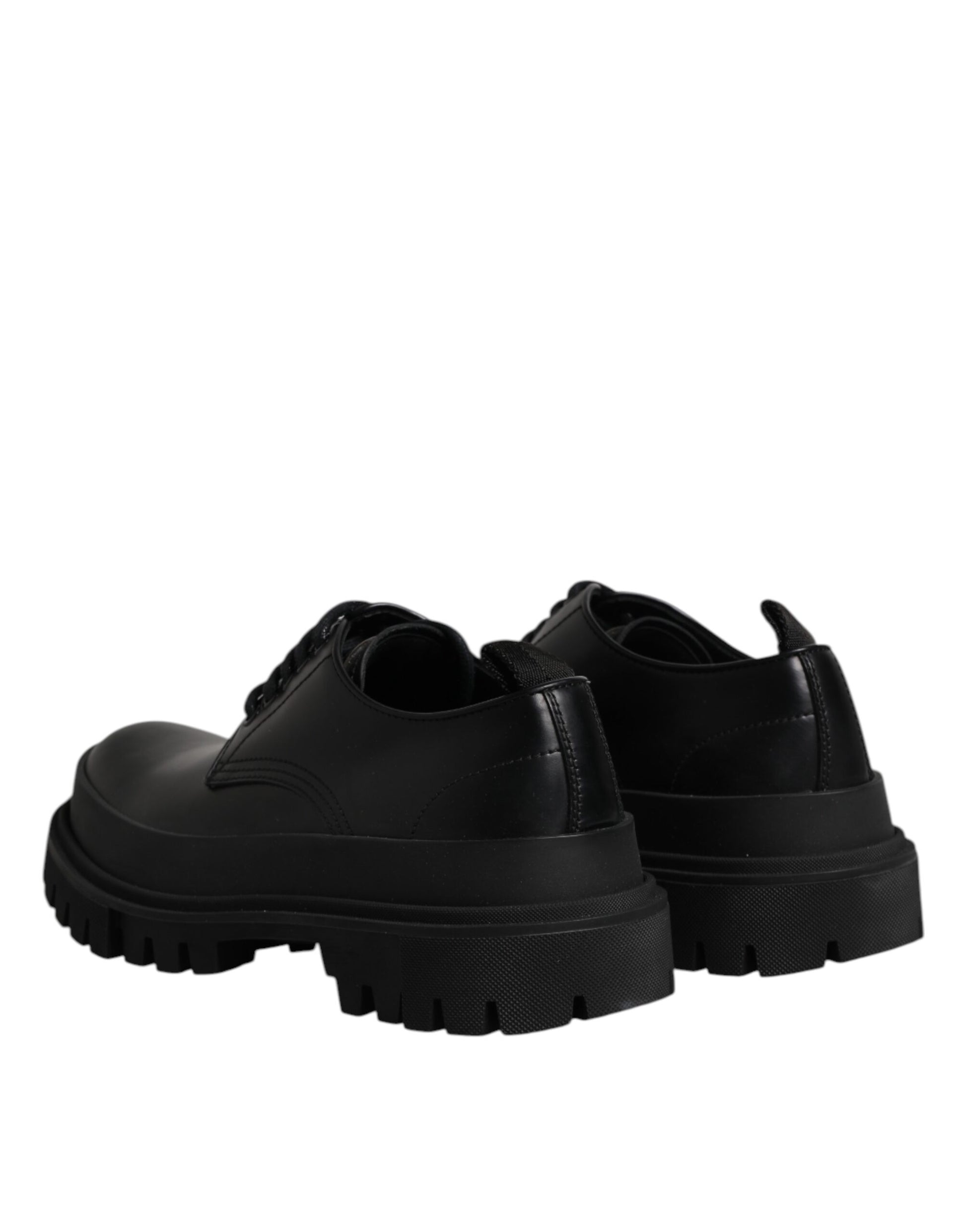 Pair of black leather lace-up dress shoes with rubber soles, designed by Dolce & Gabbana