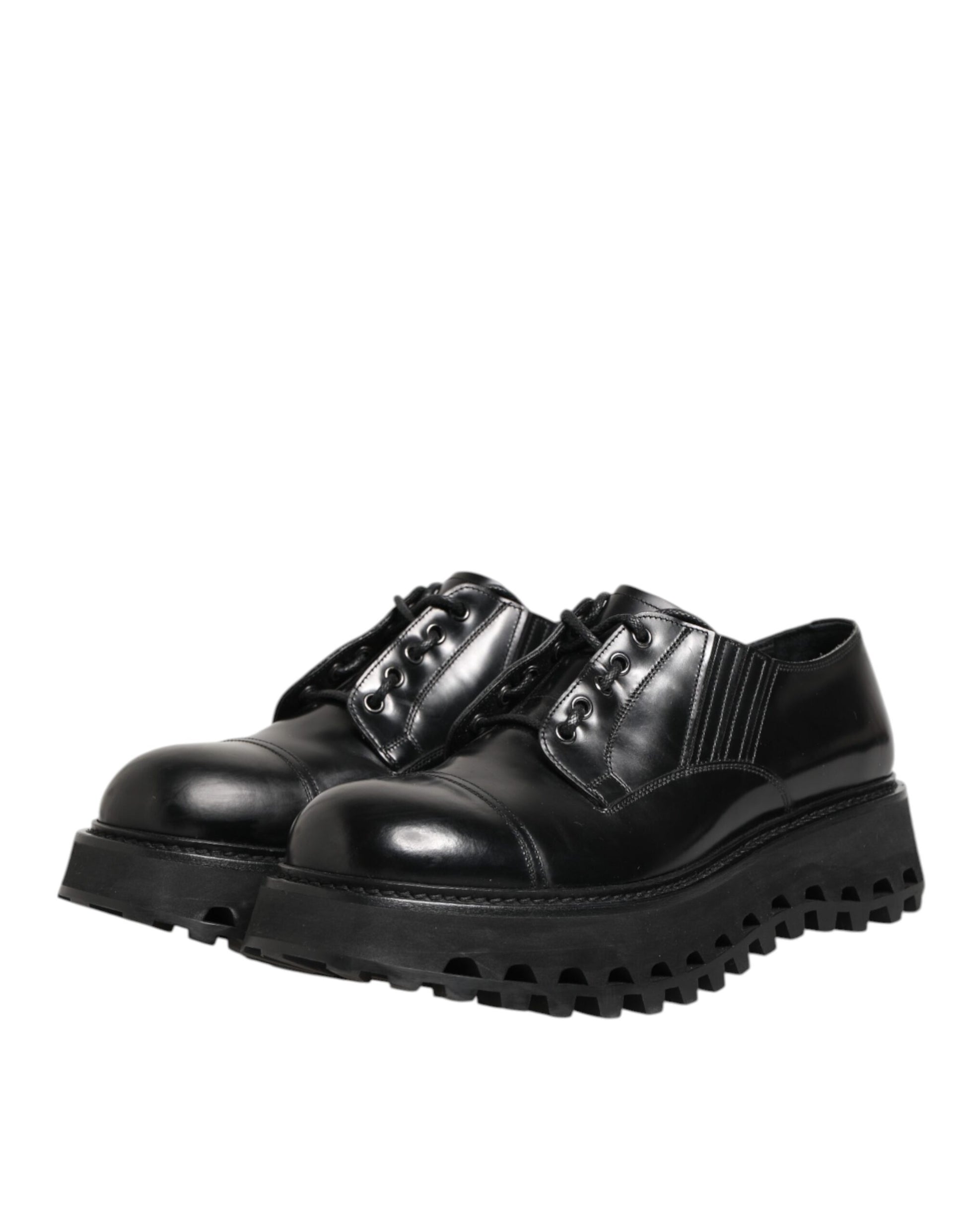 A pair of black leather lace-up derby shoes with a chunky sole