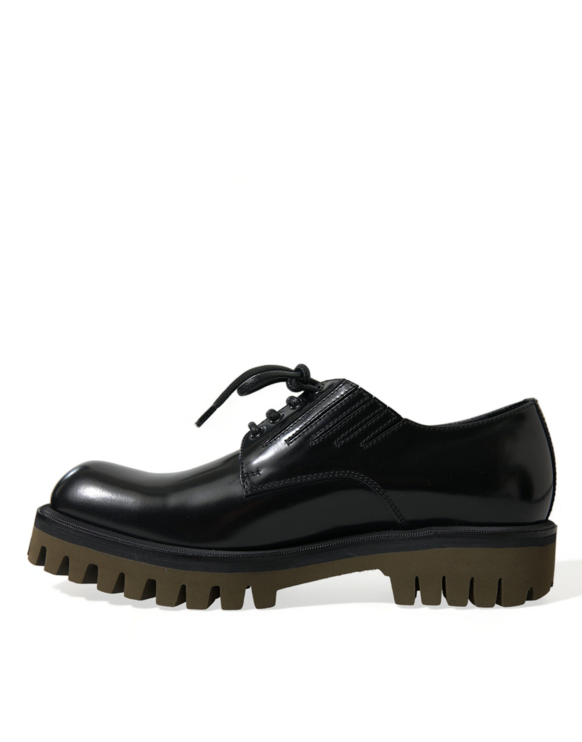 Black leather lace-up shoes with chunky heels and a strap across the top