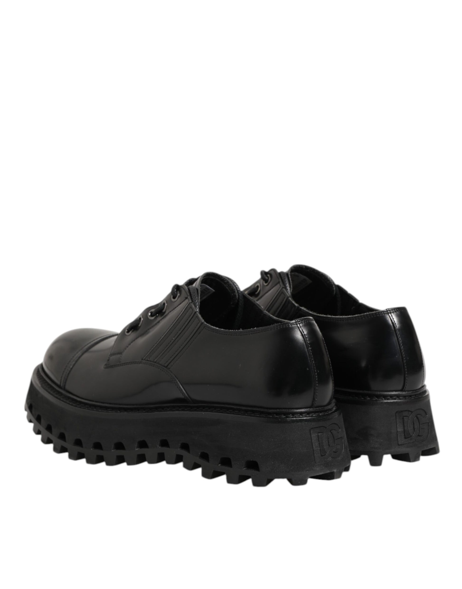 A pair of black leather lace-up derby shoes with a chunky sole
