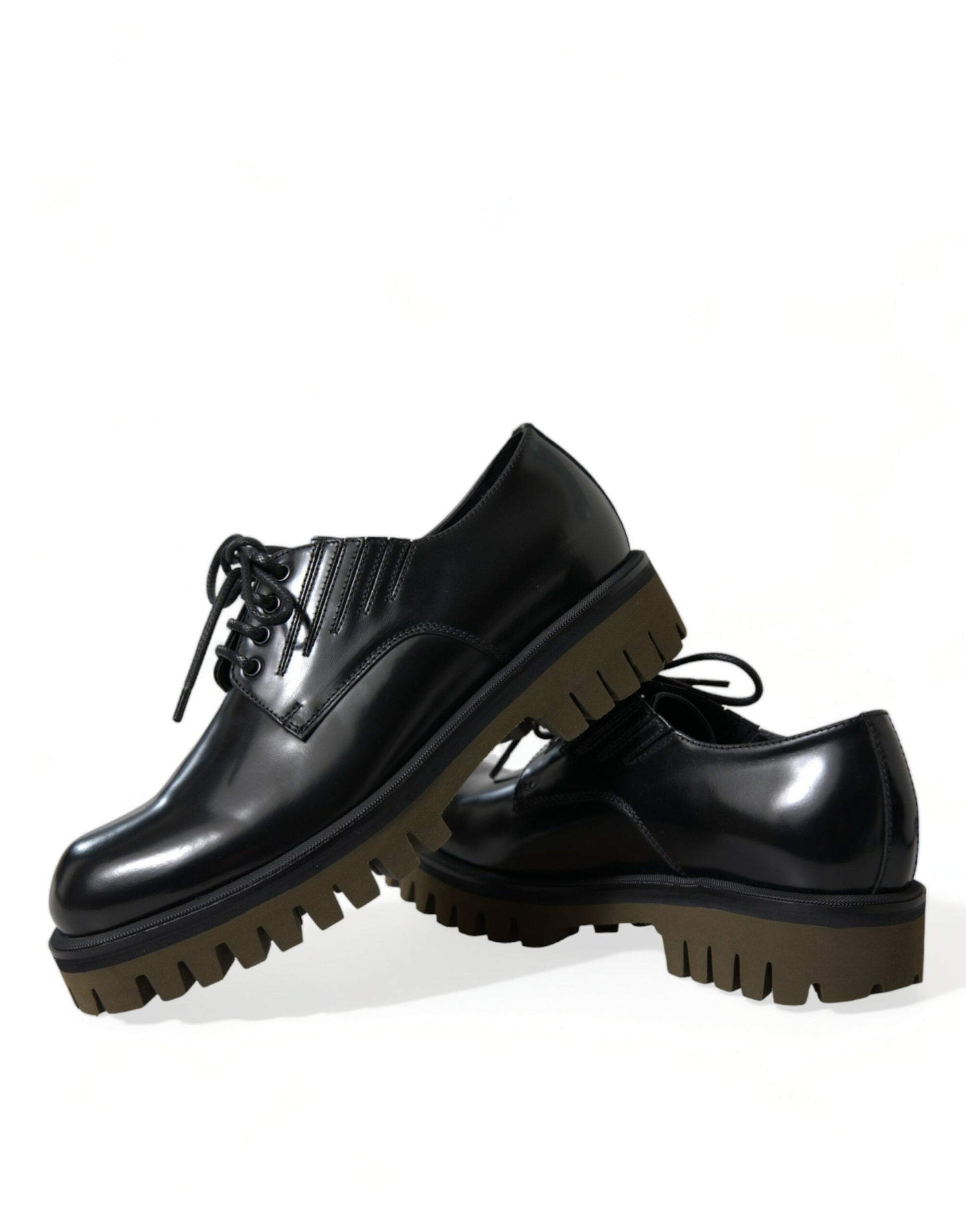 Pair of black leather shoes with chunky soles and laces