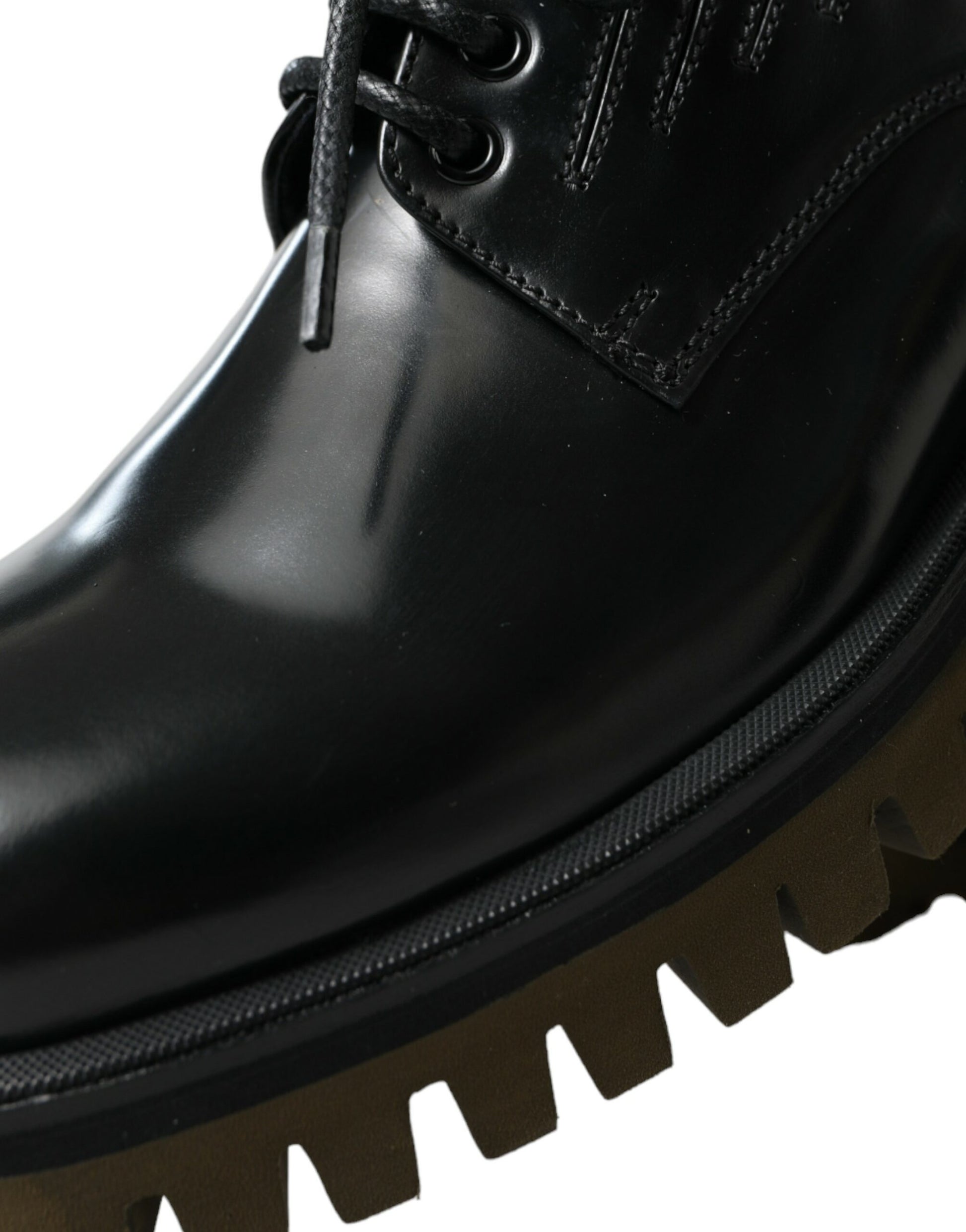 Black leather lace-up boot with a stacked heel and visible stitching details