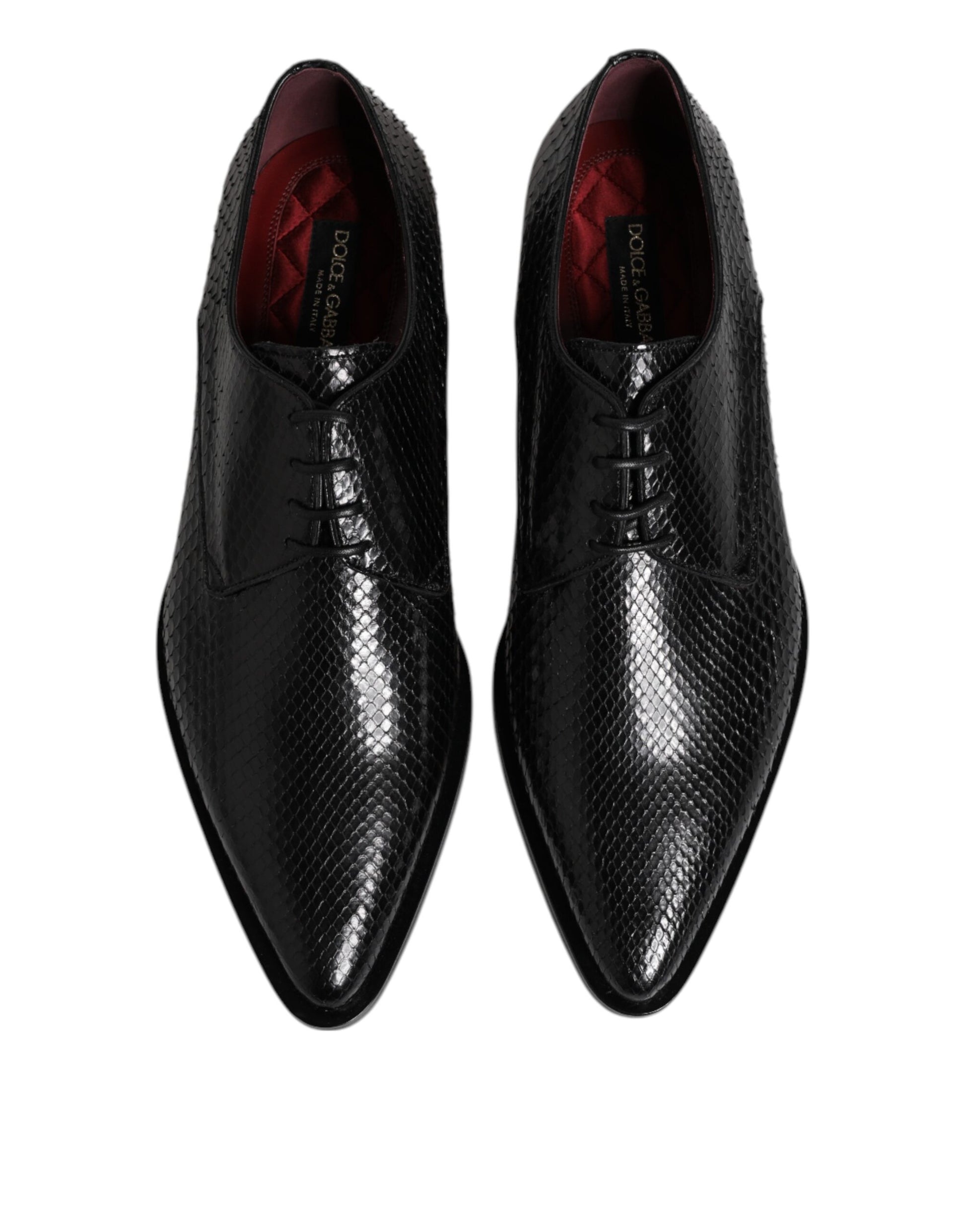 Pair of black leather lace-up dress shoes with red accents, featuring a checkered pattern on the sides