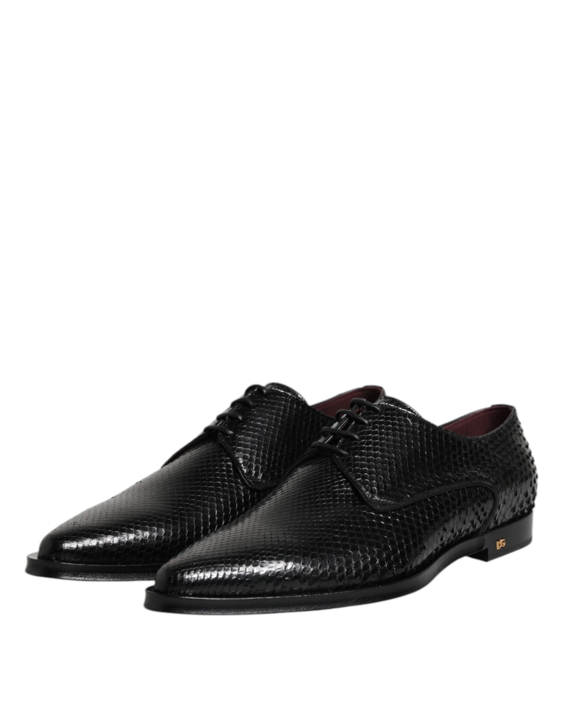Pair of black leather lace up dress shoes with red accents, designed by Dolce & Gabbana