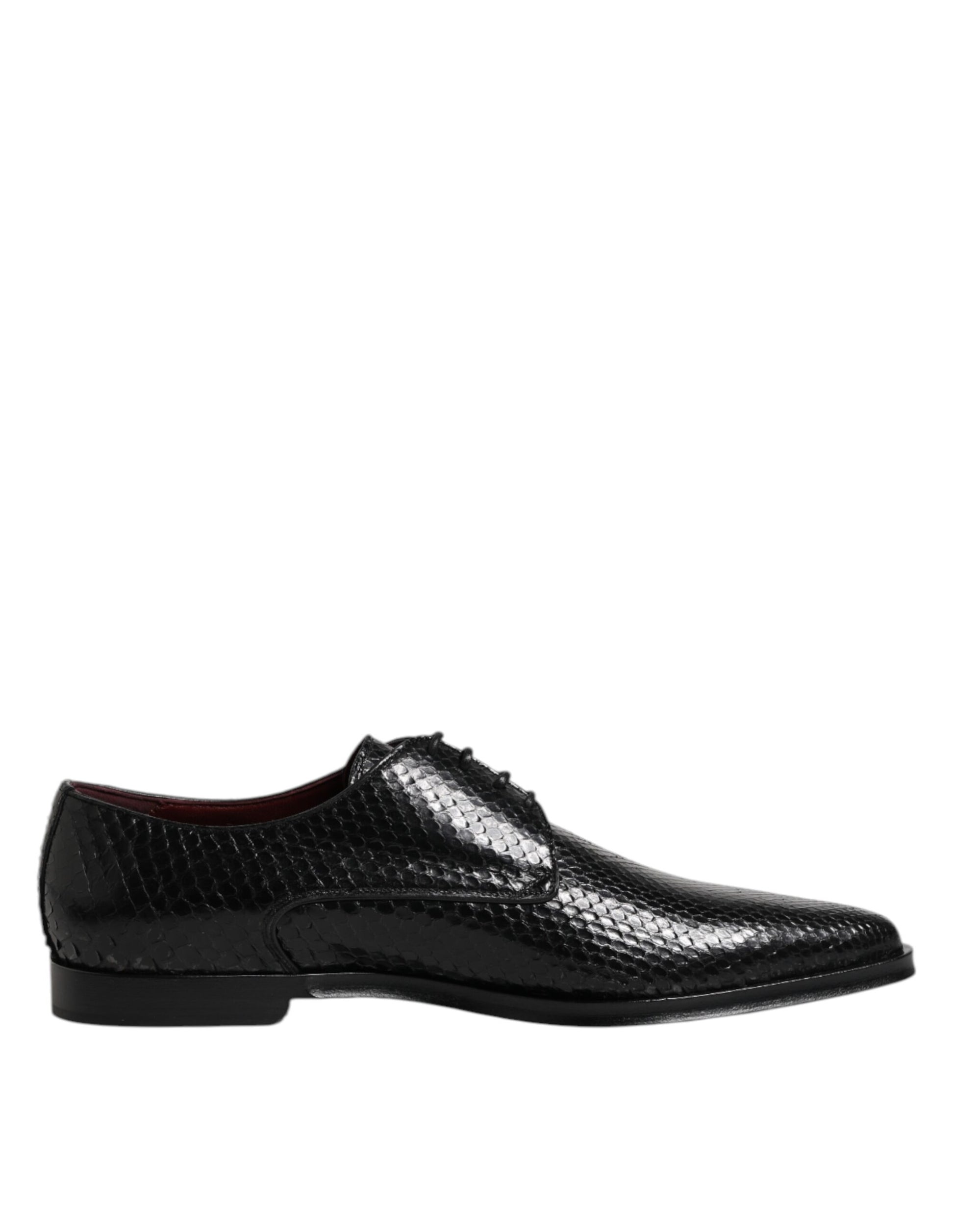 A pair of black leather lace up dress shoes with a shiny finish, featuring a unique design on the toe cap