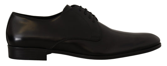 Pair of black dress shoes with laces