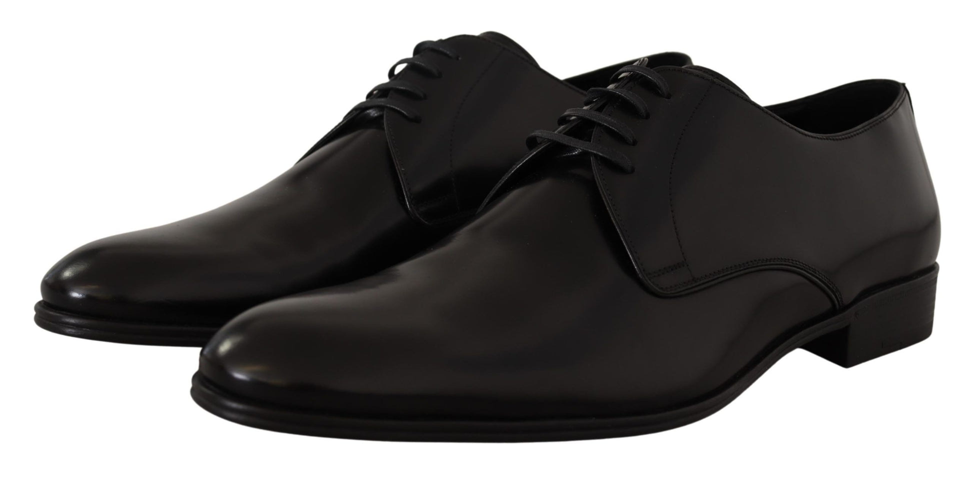Pair of black dress shoes with laces
