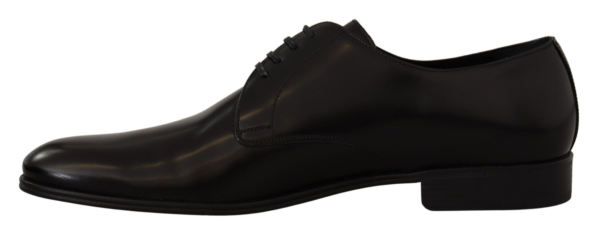 Pair of black dress shoes with laces